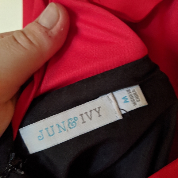 Open Back Bow dress with black mini skirt. - Picture 6 of 8